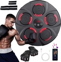 HUDOBNÝ BOXER BLUETOOTH NA TRÉNINGOVEJ BOXERSKEJ STENE S RUKAVICAMI